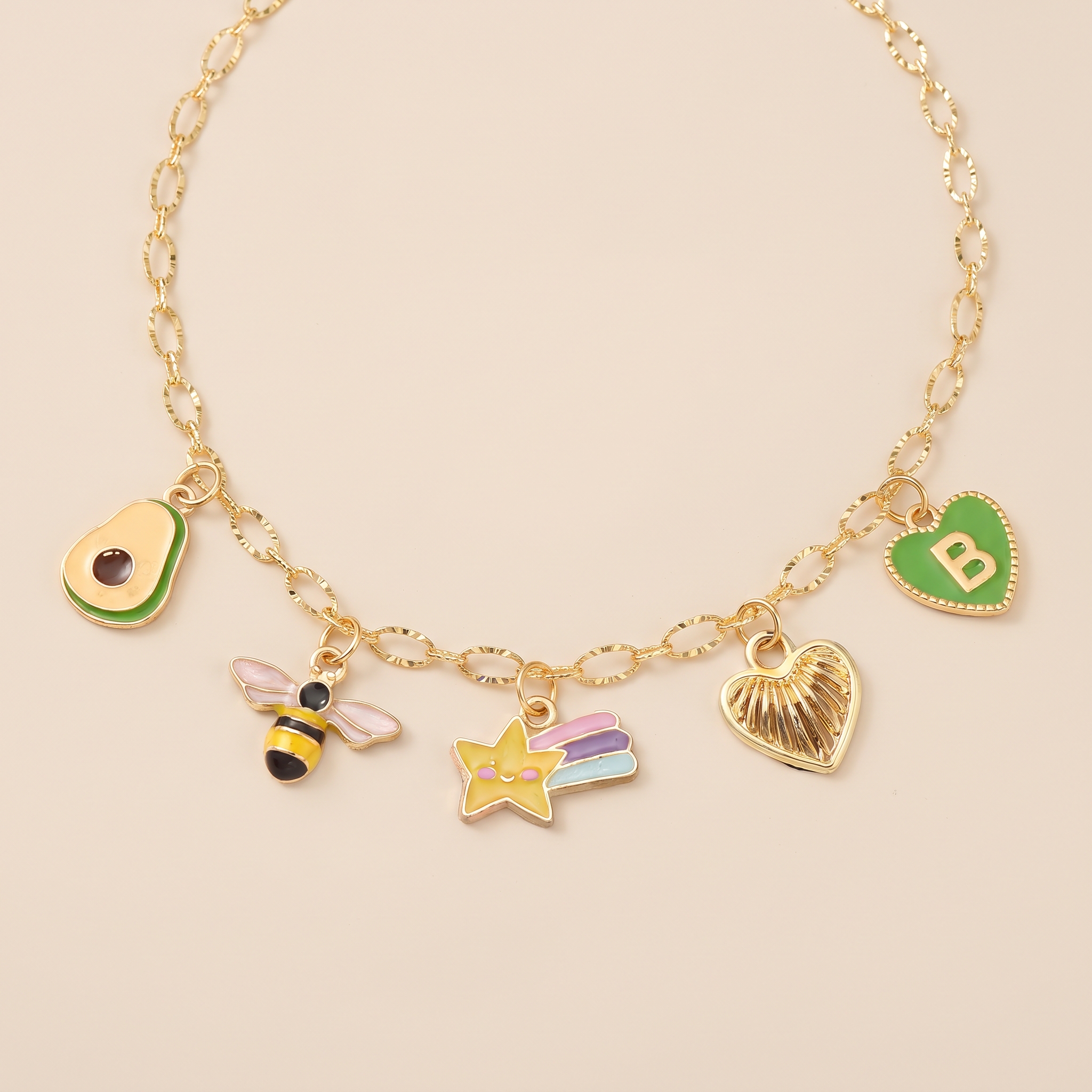 Collier Bibeejoy avec avocat, abeille, étoile filante et cœur doré